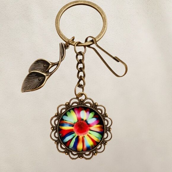 3/$25❗️Bronze Flower Glass keychain - Picture 1 of 2